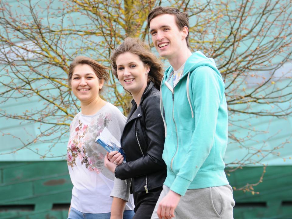Three students outside GMIT Galway campus