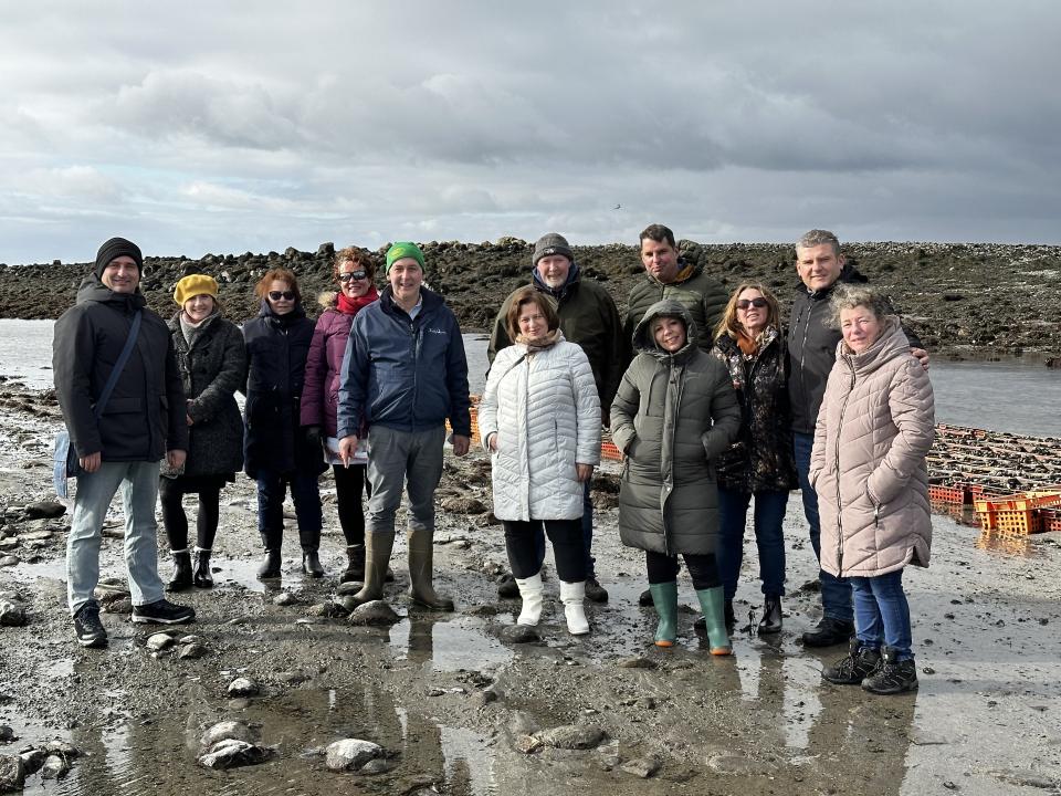 <p>Pictured at Kelly Oysters Farm, Kilcolgan, are members of the ATU-led Erasmus+ funded SCOOK Project with some of the European partners and Diarmuid Kelly (business owner). L to R: Dr Aleksandar Trajkov, Laëtitia Bertaux, Marie-Alin Martin, Dr Sarah Berthaud, Diarmuid Kelly (business owner), Dr Gordana Dimitrovska, Eamonn Hoult, Ulrich Hoeche, Dr Elena Joshevska, Christelle Leroy, Dr Kliment Naumov, Mary Reid.</p>
