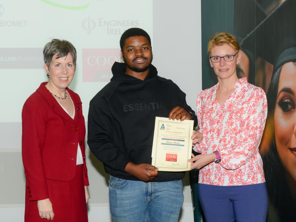 <p>Mechanical Engineering – Manufacturing Stream Competition Winner <br />
L to R: Dr Orla Flynn, President of ATU; Brian Ncube, Mechanical Engineering – Manufacturing Specialisation, Poster Competition Award recipient; and Dr Carine Gachon, Transcend Project Manager, representing Jennifer Rice, Manager, Human Resources, Cook Medical.<br />
 </p>

